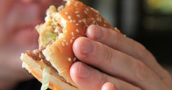 Man enjoying his hamburger