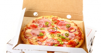Pepperoni pizza in a takeaway pizza box